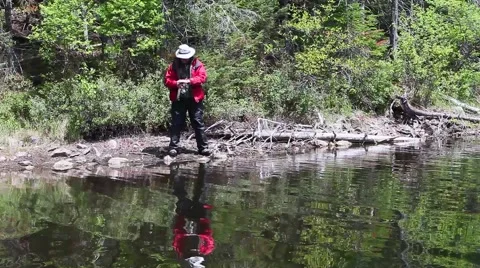 Fisherman and his reflection Stock Footage 51710253
