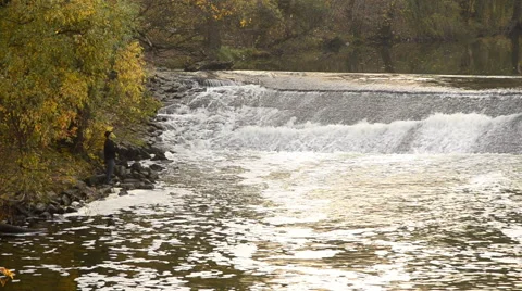 Fisherman and river in the forest Stock Footage 63392155