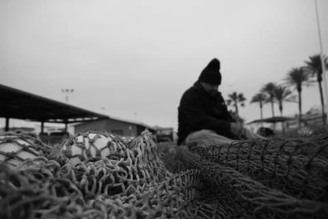 Fisherman arranges a net Foto stock