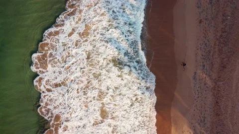 Fisherman, beach and ocean with waves Stock Footage 182297951