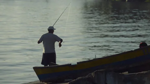 Fisherman on the beach Stock Footage 35619328