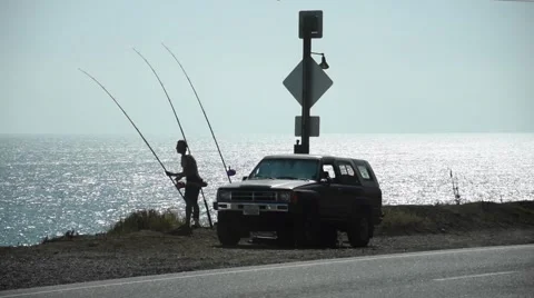 Fisherman at the beach Video stock 53135703