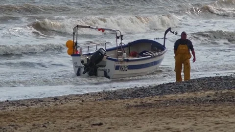Fisherman on the beach Stock-Footage 307204321