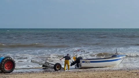 Fisherman on the beach 스톡 동영상 308384093