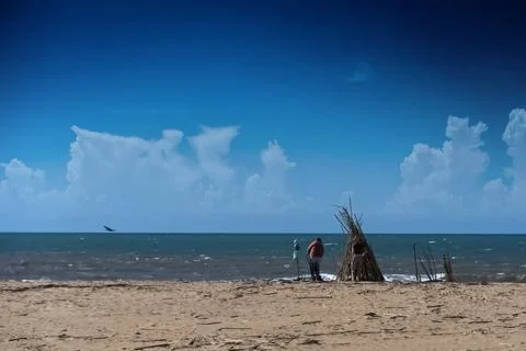 Fisherman on the beach Stock Photos