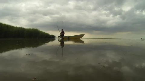 Fisherman in boat Stock Footage 43016175