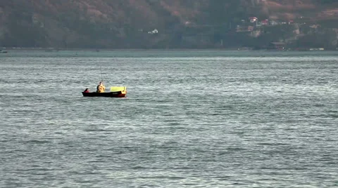 Fisherman on boat Stockbeeldmateriaal 44265057