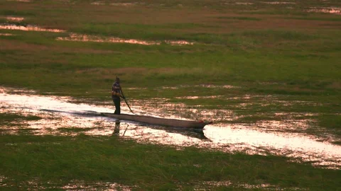Fisherman in a boat Stock Footage 129291224