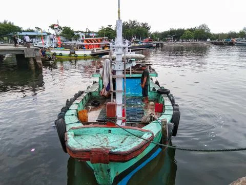Fisherman with boat Stock Photos