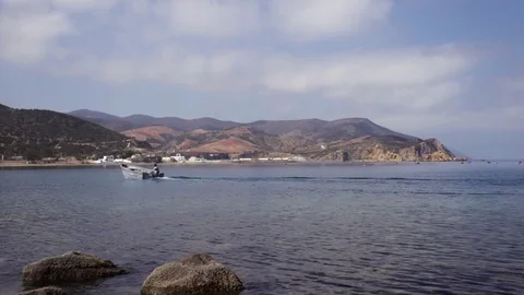 A fisherman of Cala iris Stock Footage 122737479