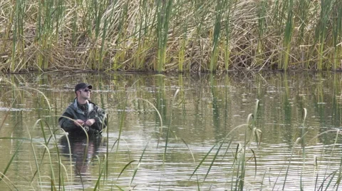 Fisherman in the cane pond Stock Footage 56107075