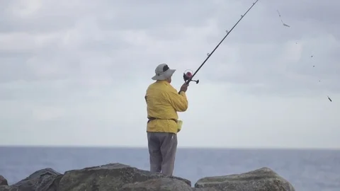 Fisherman Casting Line - Slow Motion Stockbeeldmateriaal 74492106