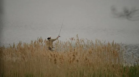 A Fisherman Casts His Bait Stock Footage 50898879