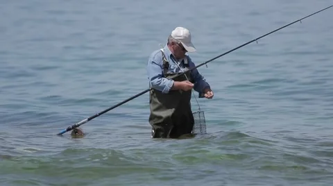 Fisherman catches a fish. Stock Footage 62063778