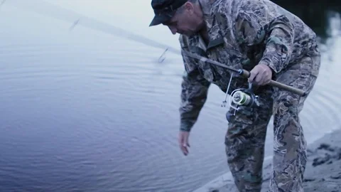 The fisherman catches the fish Stock Footage 88900644