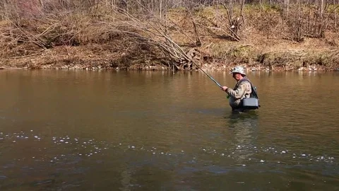 Fisherman catches of grayling in the fall Stock Footage 69226976