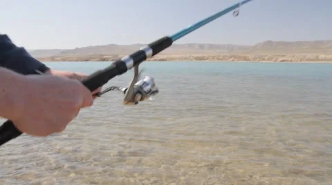 Fisherman caught the bait an old boot Stock Footage 61284087