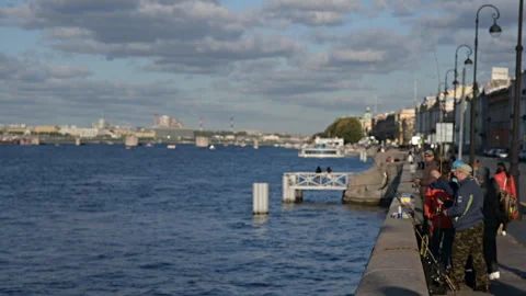 Fisherman caught a fish in a city Stock Footage 300260448
