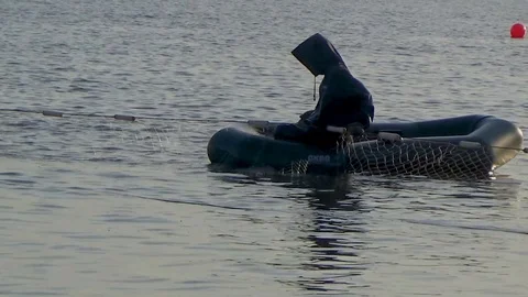Fisherman checks the net Stock Footage 100229733