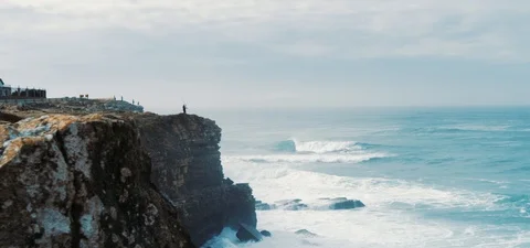 Fisherman on cliff Stock Footage 123253562