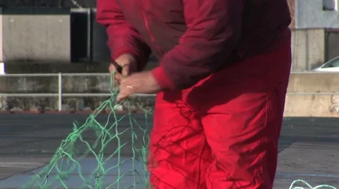 Fisherman Cutting Net Stock Footage 4275190