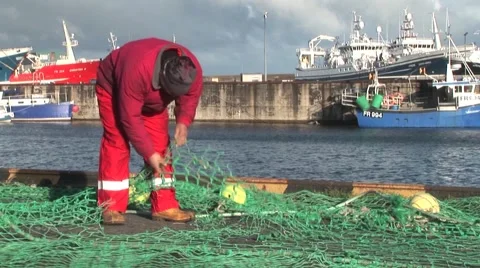 Fisherman Cutting Net Stock Footage 4275822
