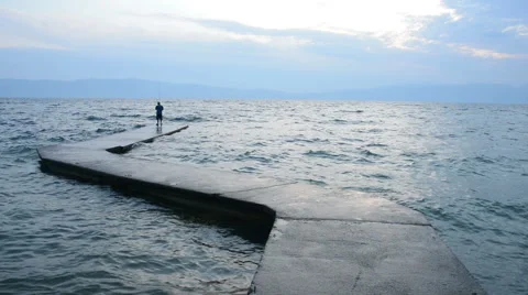 Fisherman on a Dock Stock Footage 61939697