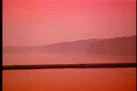 Fisherman on dock at sunset 4 Stock Footage 509800