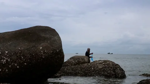 Fisherman fishing with a net Stock Footage 29995853
