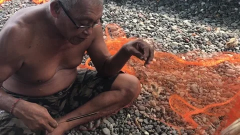 Fisherman fixing net 2 스톡 동영상 138651381