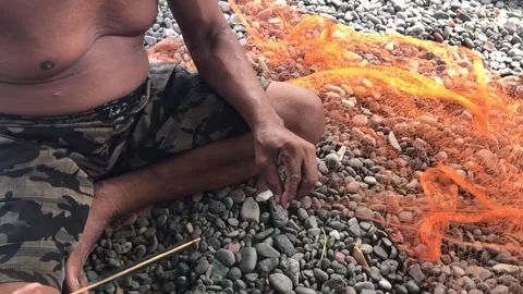 Fisherman fixing net 스톡 동영상 138651344