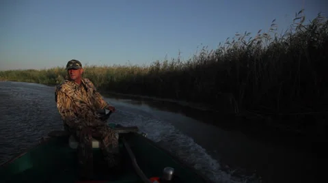 Fisherman floating on a boat on the river 動画素材 39652095