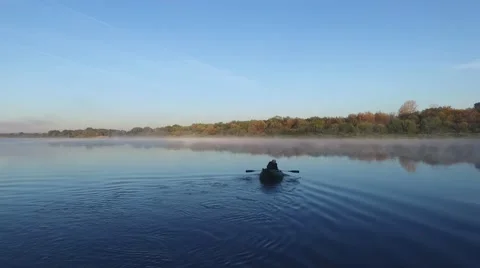 The fisherman floats on the oars Stock Footage 56246276