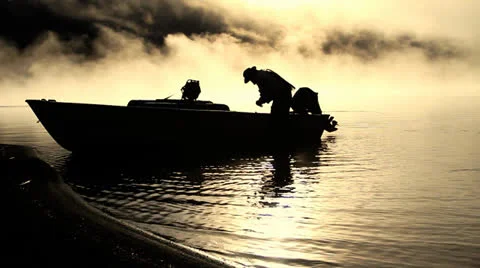 Fisherman get dawn from boat Stock Footage 22660063