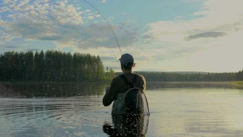 This is a fisherman going to the river to fly-fish Stock Footage 201841941