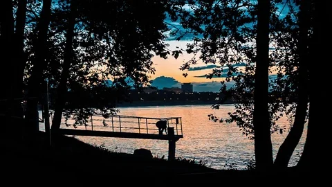 Fisherman Having A Rest By The River Vídeos de archivo 75445528
