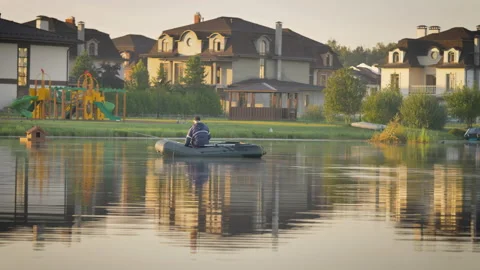 A fisherman on an inflatable boat. Stock Footage 204882475