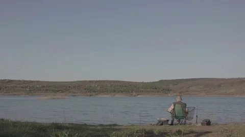 Fisherman on the lake Stock Footage 90159734
