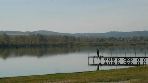 Fisherman by the lake Stock Footage 161012132