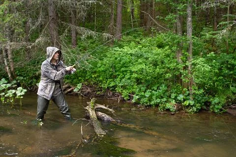 Fisherman made a hooking of fish Stock Photos