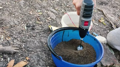 Fisherman Mixing Bait For Fish. Process Cooking Bait For Fish. Fishing Video Stock Footage 291541908