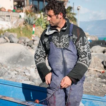 Fisherman with nets Stock Photos