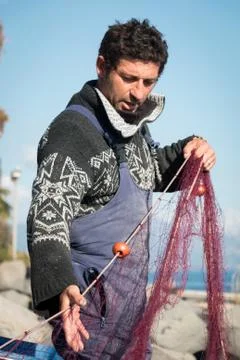 Fisherman with nets Stock Photos