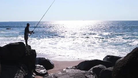 Fisherman by the ocean. Stock Footage 131402524