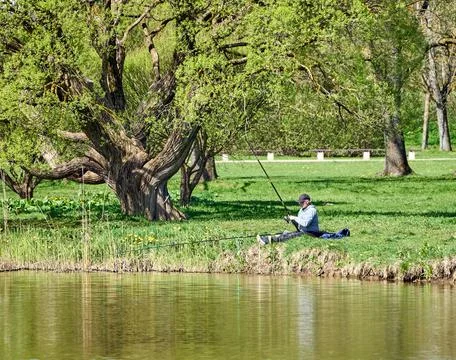 Fisherman in the park Stock Photos