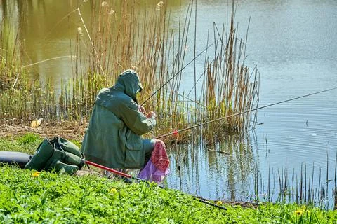 Fisherman in the park Stock Photos