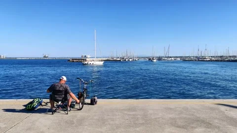 The fisherman on the pier Stock Footage 134451308