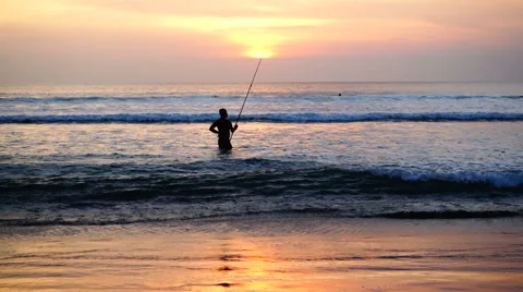 Fisherman posing in sunset Stock Footage 62360391
