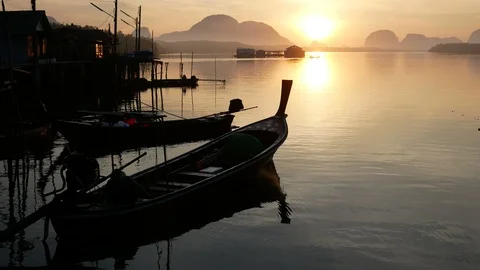 Fisherman prepare tools in long tail boat  to fishing sea. A long-tail boat i Stock Footage 89829285