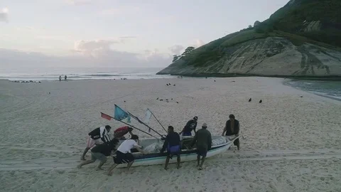 Fisherman pulling a boat Stock Footage 81070069